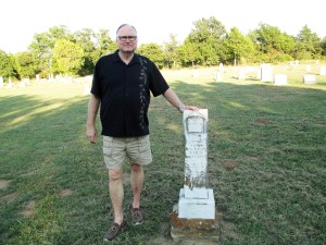 Gary stands beside grave of W.O. Smithson in Starkey Cemetery in Montague County, Texas (September 2015)