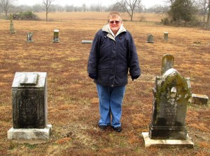 Dee Roberts visits the gravesites of John and Lavina Roberts in the Little Vine Cemetery on a cold February day in 2014 (Sumner, TX)
