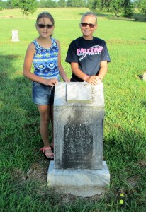 Aubrey and Camy Roberts at their 3x great-grandfather John Anderson Roberts grave in Little Vine Cemetery near Sumner, TX in Lamar County